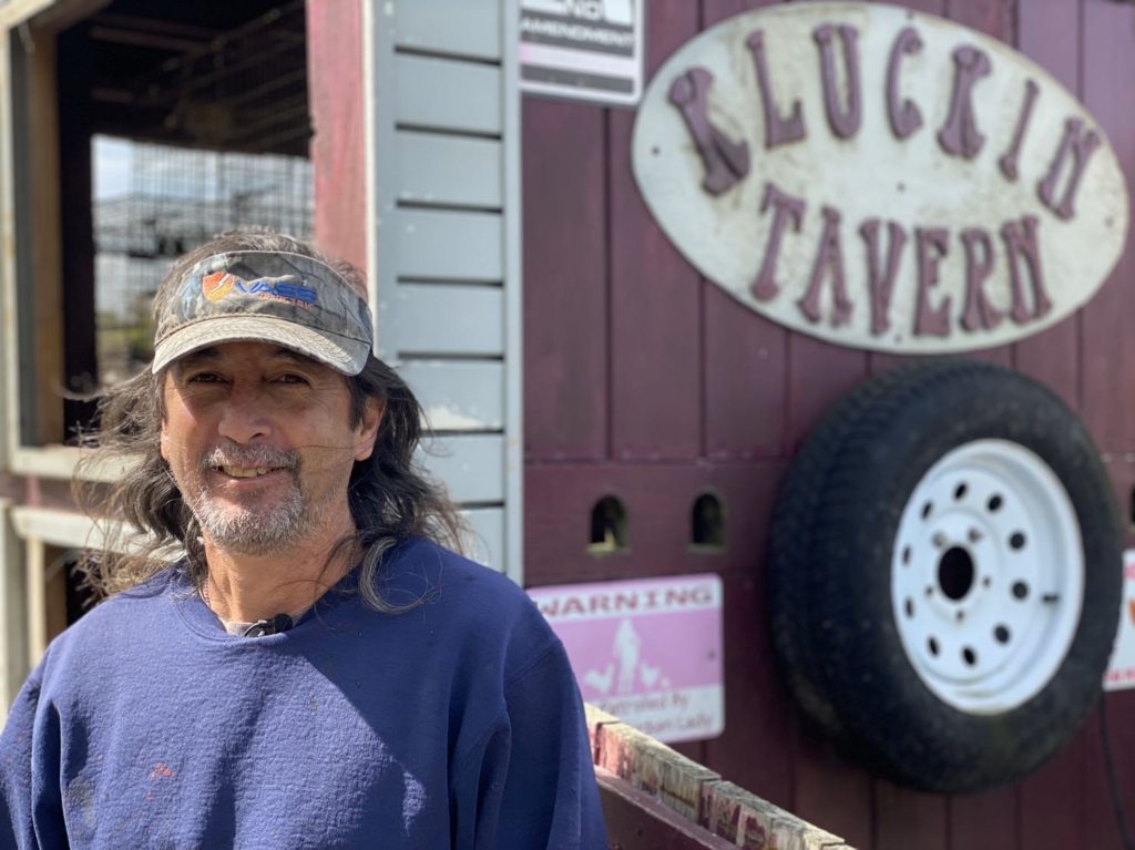 Bobby Trahan in from of his Kluckin Tavern trailer.